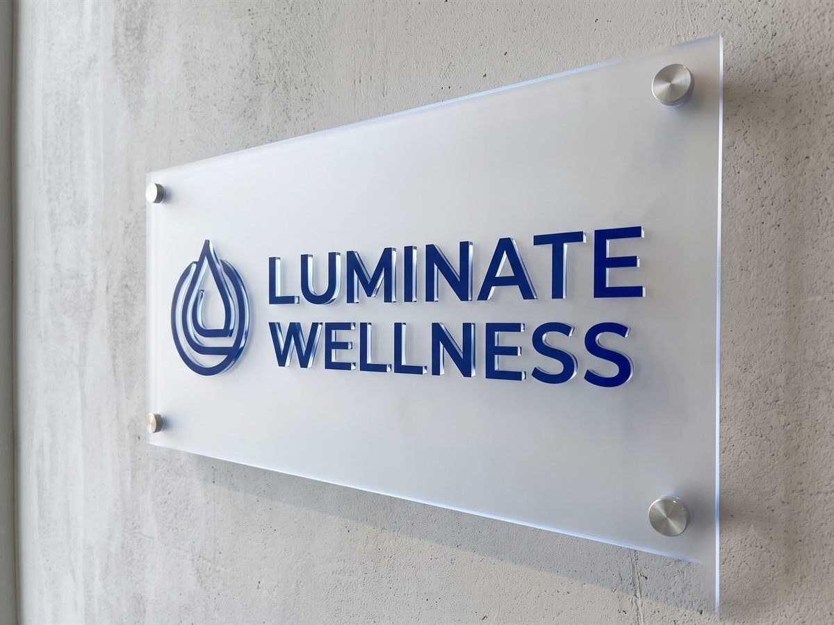 Cut and engraved frosted acrylic business signage